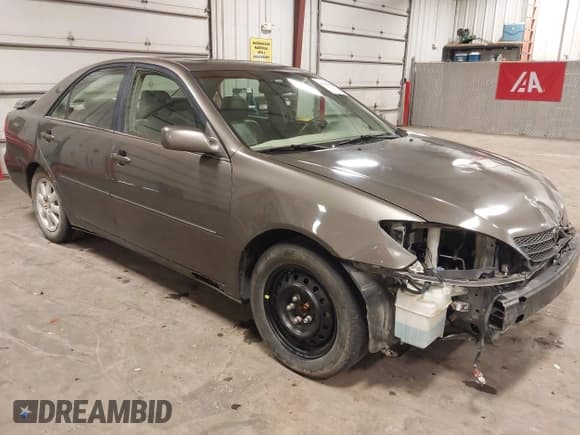 ✅ 2004 Toyota Camry XLE • VIN: 4T1BE32K74U790658 • Лот: 43116665. Опубликован ранее на IAAI с пробегом 246 808 миль. Бесплатный доступ к архиву аукционных продаж из США и подробный отчёт об истории автомобиля на DreamBid. Изображение 1.