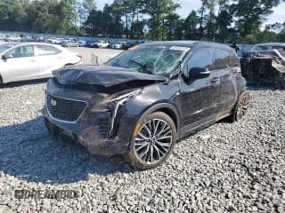 ✅ 2023 Cadillac XT4 FWD Sport • VIN: 1GYFZER4XPF197585 • Лот: 80036935. Опубликован ранее на Copart с пробегом 31 288 миль. Бесплатный доступ к архиву аукционных продаж из США и подробный отчёт об истории автомобиля на DreamBid. Изображение 1.