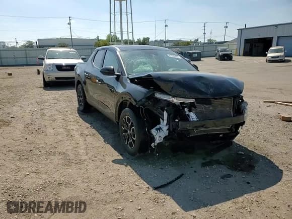 ✅ 2022 Hyundai Santa Cruz SEL • VIN: 5NTJBDAE6NH028252 • Lot: 81002405. Listed on Copart with 69,670 mi. Free auction sales archive from the USA and detailed vehicle history report at DreamBid. Image 14.