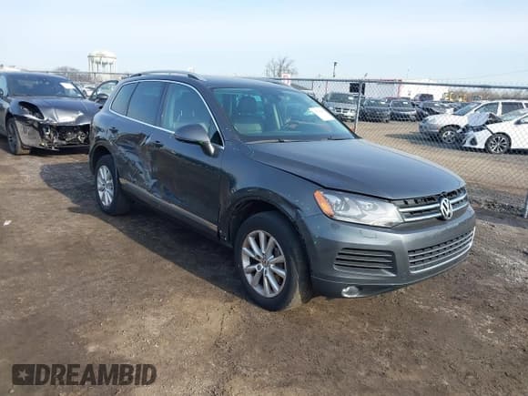 ✅ 2014 Volkswagen Touareg Sport • VIN: WVGEF9BP9ED010718 • Лот: 41786403. Опубликован ранее на IAAI с пробегом 149 569 миль. Бесплатный доступ к архиву аукционных продаж из США и подробный отчёт об истории автомобиля на DreamBid. Изображение 1.