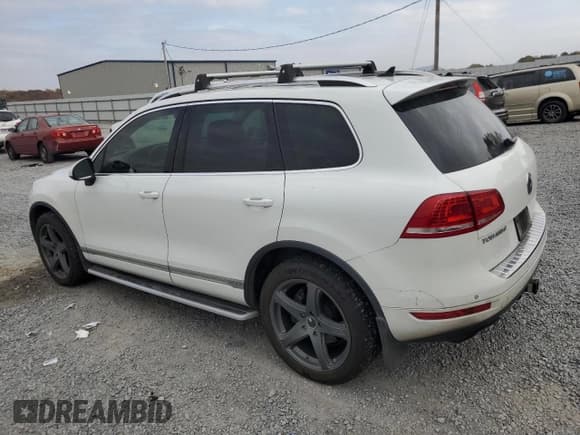 ✅ 2013 Volkswagen Touareg • VIN: WVGEG9BPXDD012733 • Lot: 91858355. Listed on Copart with 116,232 mi. Free auction sales archive from the USA and detailed vehicle history report at DreamBid. Image 2.