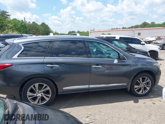 ✅ 2013 Infiniti JX35 • VIN: 5N1AL0MM9DC350915 • Lot: 42076964. Listed on IAAI with 162,617 mi. Free auction sales archive from the USA and detailed vehicle history report at DreamBid. Image 12.