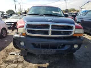 2003 Dodge Dakota Sport z VIN 1D7HL38NX3S222930, wystawiony jako Copart lot #71812234 z przebiegiem 203 140 mil mil oraz Szkoda całkowita • Salvage title. Historia ofert i sprzedaży dostępna na DreamBid. Obrazek 5.