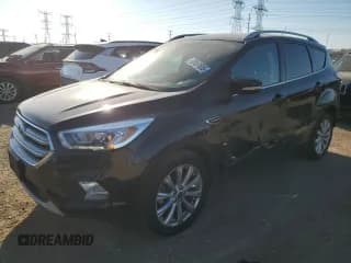 ✅ 2017 Ford Escape Titanium • VIN: 1FMCU0JD6HUA80424 • Lot: 92457605. Wystawiony na Copart z przebiegiem 86 139 mil. Bezpłatny archiwum sprzedaży aukcyjnych z USA i szczegółowy raport historii pojazdu na DreamBid. Zdjęcie 1.