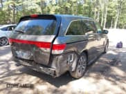 ✅ 2014 Honda Odyssey Touring • VIN: 5FNRL5H96EB083005 • Lot: 43019031. Listed on IAAI with 141,688 mi. Free auction sales archive from the USA and detailed vehicle history report at DreamBid. Image 18.