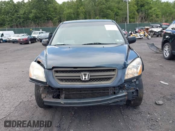 2003 Honda Pilot LX with VIN 2HKYF18173H544653, listed as a IAAI auction lot 42687162 with 258,132 mi miles and . Bid and sale history available at DreamBid. Image 12.