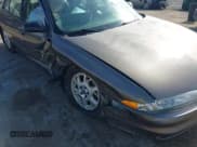 ✅ 2000 Oldsmobile Intrigue GX • VIN: 1G3WH52H0YF280823 • Lot: 42199925. Wystawiony na IAAI z przebiegiem 102 427 mil. Bezpłatny archiwum sprzedaży aukcyjnych z USA i szczegółowy raport historii pojazdu na DreamBid. Zdjęcie 6.
