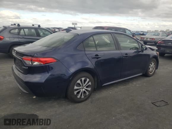 ✅ 2022 Toyota Corolla Hybrid LE • VIN: JTDEAMDE2NJ060329 • Lot: 93658555. Wystawiony na Copart z przebiegiem 65 608 mil. Bezpłatny archiwum sprzedaży aukcyjnych z USA i szczegółowy raport historii pojazdu na DreamBid. Zdjęcie 3.