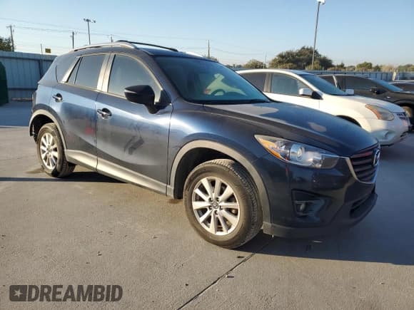 ✅ 2016 Mazda CX-5 Touring • VIN: JM3KE2CY9G0860374 • Lot: 86870165. Listed on Copart with 132,839 mi. Free auction sales archive from the USA and detailed vehicle history report at DreamBid. Image 4.
