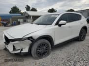 ✅ 2021 Mazda CX-5 Touring • VIN: JM3KFBCM3M0452068 • Lot: 82182915. Wystawiony na Copart z przebiegiem 24 079 mil. Bezpłatny archiwum sprzedaży aukcyjnych z USA i szczegółowy raport historii pojazdu na DreamBid. Zdjęcie 1.