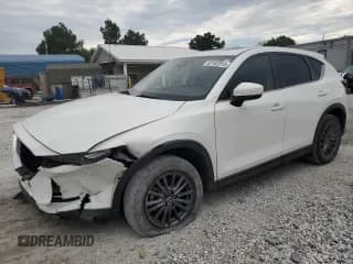 ✅ 2021 Mazda CX-5 Touring • VIN: JM3KFBCM3M0452068 • Lot: 82182915. Wystawiony na Copart z przebiegiem 24 079 mil. Bezpłatny archiwum sprzedaży aukcyjnych z USA i szczegółowy raport historii pojazdu na DreamBid. Zdjęcie 1.