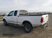 ✅ 1998 Ford F-250 • VIN: 1FTPX28L4WKA41149 • Lot: 84369654. Listed on Copart with 430,187 mi. Free auction sales archive from the USA and detailed vehicle history report at DreamBid. Image 2.