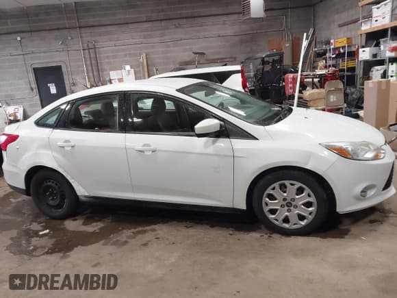 ✅ 2012 Ford Focus SE • VIN: 1FAHP3F21CL301085 • Lot: 42321328. Listed on IAAI with 157,818 mi. Free auction sales archive from the USA and detailed vehicle history report at DreamBid. Image 13.