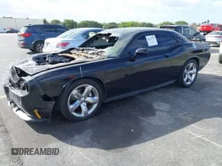 ✅ 2012 Dodge Challenger SXT • VIN: 2C3CDYAG1CH186518 • Lot: 41261555. Wystawiony na IAAI z przebiegiem Nie podano. Bezpłatny archiwum sprzedaży aukcyjnych z USA i szczegółowy raport historii pojazdu na DreamBid. Zdjęcie 2.