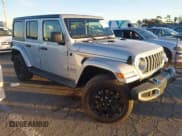 ✅ 2023 Jeep Wrangler Sahara • VIN: 1C4JJXP65PW630477 • Lot: 43864711. Listed on IAAI with 10,033 mi. Free auction sales archive from the USA and detailed vehicle history report at DreamBid. Image 1.