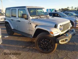 ✅ 2023 Jeep Wrangler Sahara • VIN: 1C4JJXP65PW630477 • Lot: 43864711. Listed on IAAI with 10,033 mi. Free auction sales archive from the USA and detailed vehicle history report at DreamBid. Image 1.