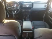 ✅ 2024 Jeep Wrangler Sahara • VIN: 1C4PJXEG1RW262694 • Lot: 90266305. Listed on Copart with 12,760 mi. Free auction sales archive from the USA and detailed vehicle history report at DreamBid. Image 8.