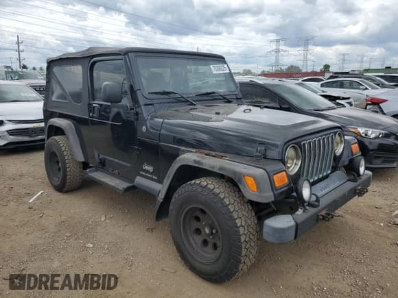 ✅ 2005 Jeep Wrangler Unlimited • VIN: 1J4FA44S25P335120 • Lot: 70306025. Listed on Copart with 137,315 mi. Free auction sales archive from the USA and detailed vehicle history report at DreamBid. Image 4.