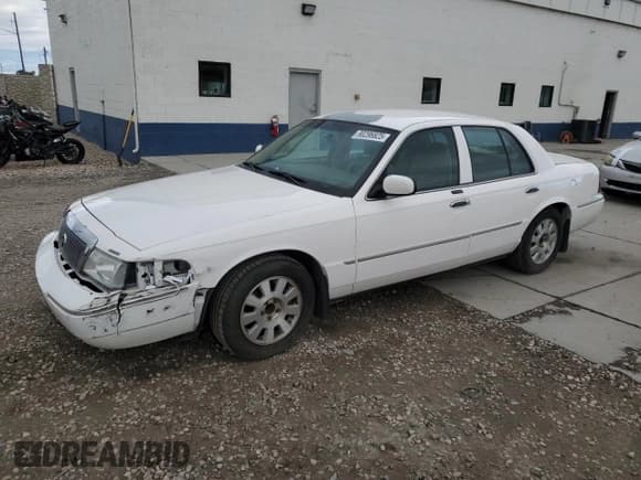✅ 2003 Mercury Grand Marquis LS Premium • VIN: 2MEFM75W03X698022 • Lot: 90296825. Listed on Copart with 114,903 mi. Free auction sales archive from the USA and detailed vehicle history report at DreamBid. Image 1.
