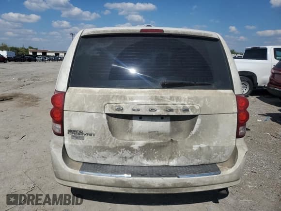 ✅ 2012 Dodge Grand Caravan SE • VIN: 2C4RDGBG9CR336593 • Lot: 81896515. Listed on Copart with Not provided. Free auction sales archive from the USA and detailed vehicle history report at DreamBid. Image 6.