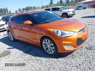 ✅ 2013 Hyundai Veloster w/Black Int • VIN: KMHTC6AD8DU085270 • Лот: 43240226. Опубликован ранее на IAAI с пробегом 119 444 миль. Бесплатный доступ к архиву аукционных продаж из США и подробный отчёт об истории автомобиля на DreamBid. Изображение 1.