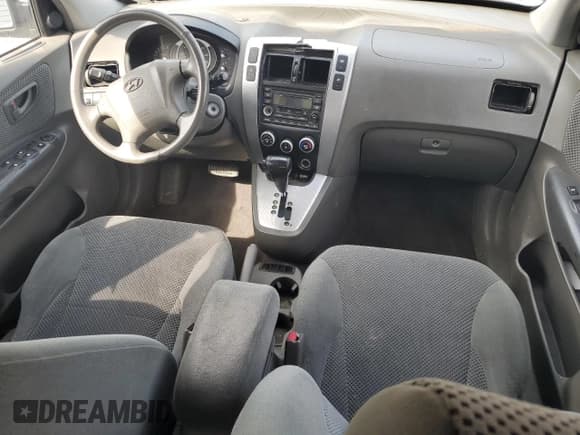 ✅ 2006 Hyundai Tucson GLS • VIN: KM8JN12D76U263904 • Лот: 60747175. Опубликован ранее на Copart с пробегом 256 616 миль. Бесплатный доступ к архиву аукционных продаж из США и подробный отчёт об истории автомобиля на DreamBid. Изображение 8.