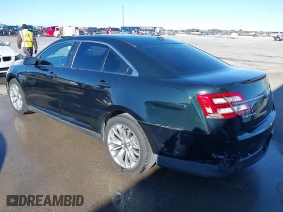 ✅ 2014 Ford Taurus Limited • VIN: 1FAHP2F83EG104915 • Lot: 41406872. Listed on IAAI with 167,658 mi. Free auction sales archive from the USA and detailed vehicle history report at DreamBid. Image 3.