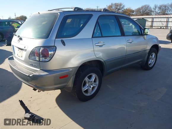 ✅ 2003 Lexus RX 300 • VIN: JTJGF10UX30158997 • Lot: 43907351. Listed on IAAI with 187,395 mi. Free auction sales archive from the USA and detailed vehicle history report at DreamBid. Image 4.