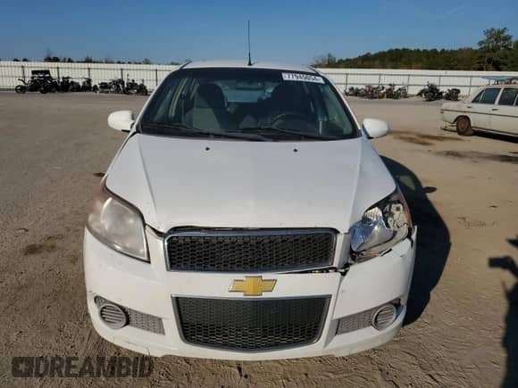2011 Chevrolet Aveo 1LT z VIN KL1TD6DE2BB242037, wystawiony jako Copart lot #77945054 z przebiegiem 226 309 mil mil oraz Szkoda całkowita • Salvage title. Historia ofert i sprzedaży dostępna na DreamBid. Obrazek 5.