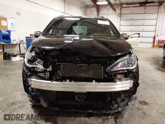 ✅ 2020 Chrysler Pacifica Hybrid Limited • VIN: 2C4RC1N75LR105539 • Лот: 42693774. Опубликован ранее на IAAI с пробегом 97 310 миль. Бесплатный доступ к архиву аукционных продаж из США и подробный отчёт об истории автомобиля на DreamBid. Изображение 13.