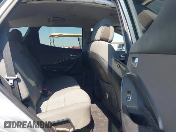 ✅ 2017 Hyundai Santa Fe 2.4L • VIN: 5XYZTDLB6HG468565 • Лот: 43207692. Опубликован ранее на IAAI с пробегом 148 556 миль. Бесплатный доступ к архиву аукционных продаж из США и подробный отчёт об истории автомобиля на DreamBid. Изображение 8.