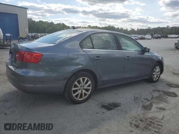 ✅ 2013 Volkswagen Jetta SE • VIN: 3VWDP7AJ1DM452438 • Lot: 71840025. Listed on Copart with 173,568 mi. Free auction sales archive from the USA and detailed vehicle history report at DreamBid. Image 3.