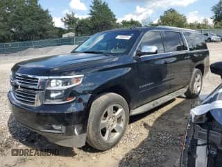 2017 Chevrolet Suburban Premier z VIN 1GNSCJKC6HR113981, wystawiony jako Copart lot #71048205 z przebiegiem 146 020 mil mil oraz Czysty tytuł • Clean title. Historia ofert i sprzedaży dostępna na DreamBid. Obrazek 1.