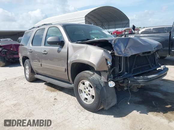 ✅ 2014 Chevrolet Tahoe LT • VIN: 1GNSCBE0XER247248 • Lot: 42438570. Listed on IAAI with 108,455 mi. Free auction sales archive from the USA and detailed vehicle history report at DreamBid. Image 1.