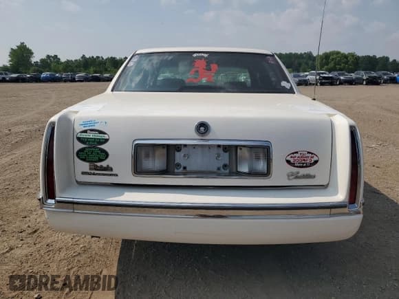 ✅ 1996 Cadillac DeVille • VIN: 1G6KD52Y0TU304801 • Lot: 59718265. Listed on Copart with 144,086 mi. Free auction sales archive from the USA and detailed vehicle history report at DreamBid. Image 6.