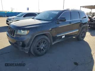 2011 Jeep Grand Cherokee Laredo z VIN 1J4RR4GGXBC506602, wystawiony jako Copart lot #82678145 z przebiegiem 167 440 mil mil oraz Szkoda całkowita • Salvage title. Historia ofert i sprzedaży dostępna na DreamBid. Obrazek 1.