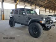 ✅ 2022 Jeep Wrangler Unlimited High Tide • VIN: 1C4HJXDG2NW221829 • Lot: 64836074. Listed on Copart with 3,394 mi. Free auction sales archive from the USA and detailed vehicle history report at DreamBid. Image 4.