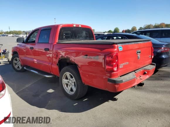 2007 Dodge Dakota SLT z VIN 1D7HW48N57S103881, wystawiony jako Copart lot #75803604 z przebiegiem 194 688 mil mil oraz Szkoda całkowita • Salvage title. Historia ofert i sprzedaży dostępna na DreamBid. Obrazek 2.