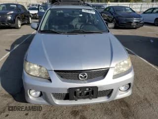 ✅ 2003 Mazda Protege • VIN: JM1BJ246331220991 • Lot: 86839925. Wystawiony na Copart z przebiegiem 118 760 mil. Bezpłatny archiwum sprzedaży aukcyjnych z USA i szczegółowy raport historii pojazdu na DreamBid. Zdjęcie 5.
