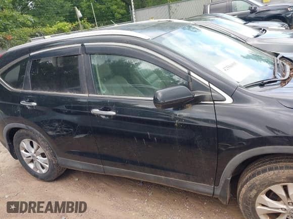 ✅ 2012 Honda CR-V Touring • VIN: 2HKRM4H93CH116774 • Lot: 42586905. Listed on IAAI with 118,789 mi. Free auction sales archive from the USA and detailed vehicle history report at DreamBid. Image 13.