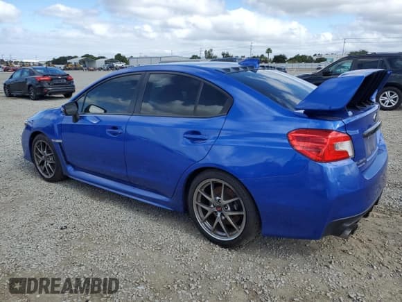 ✅ 2017 Subaru WRX STI Limited • VIN: JF1VA2Y64H9823891 • Lot: 56522635. Listed on Copart with 79,463 mi. Free auction sales archive from the USA and detailed vehicle history report at DreamBid. Image 2.