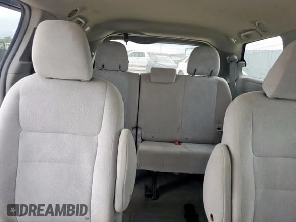 ✅ 2015 Toyota Sienna L • VIN: 5TDZK3DC0FS540977 • Lot: 93201355. Listed on Copart with 217,326 mi. Free auction sales archive from the USA and detailed vehicle history report at DreamBid. Image 10.
