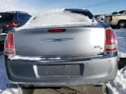 ✅ 2013 Chrysler 300 S • VIN: 2C3CCAGG4DH590142 • Лот: 88952055. Опубликован ранее на Copart с пробегом 146 325 миль. Бесплатный доступ к архиву аукционных продаж из США и подробный отчёт об истории автомобиля на DreamBid. Изображение 6.