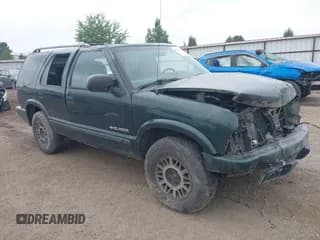 ✅ 2002 Chevrolet Blazer LS • VIN: 1GNDT13W22K228255 • Lot: 42923627. Wystawiony na IAAI z przebiegiem 166 545 mil. Bezpłatny archiwum sprzedaży aukcyjnych z USA i szczegółowy raport historii pojazdu na DreamBid. Zdjęcie 1.