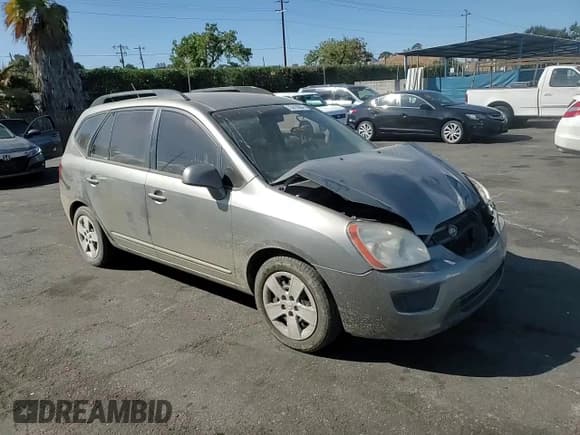 ✅ 2009 Kia Rondo LX • VIN: KNAFG528497221625 • Лот: 75915694. Опубликован ранее на Copart с пробегом 245 165 миль. Бесплатный доступ к архиву аукционных продаж из США и подробный отчёт об истории автомобиля на DreamBid. Изображение 12.