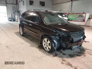 2011 Chevrolet Traverse LTZ z VIN 1GNKRLEDXBJ373272, wystawiony jako IAAI lot #42397113 z przebiegiem Nie podano mil oraz . Historia ofert i sprzedaży dostępna na DreamBid. Obrazek 1.