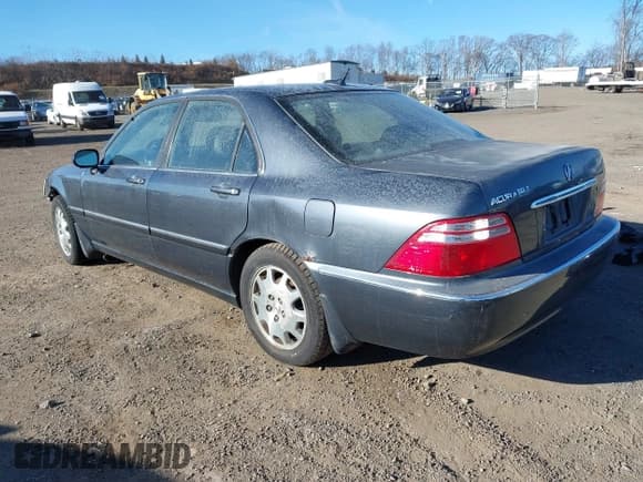 ✅ 2004 Acura RL w/Navigation System • VIN: JH4KA96654C001699 • Lot: 43874080. Listed on IAAI with 205,999 mi. Free auction sales archive from the USA and detailed vehicle history report at DreamBid. Image 3.
