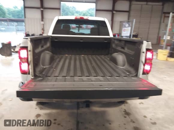 2015 Chevrolet Silverado 1500 LT z VIN 1GCRCREH0FZ398560, wystawiony jako IAAI lot #42454940 z przebiegiem 158 025 mil mil oraz . Historia ofert i sprzedaży dostępna na DreamBid. Obrazek 22.