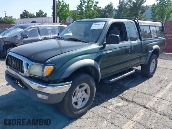 ✅ 2002 Toyota Tacoma PreRunner • VIN: 5TESN92N22Z095154 • Lot: 42516871. Listed on IAAI with 249,350 mi. Free auction sales archive from the USA and detailed vehicle history report at DreamBid. Image 2.