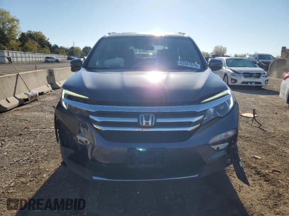 ✅ 2018 Honda Pilot Touring • VIN: 5FNYF6H91JB005668 • Лот: 85587675. Опубликован ранее на Copart с пробегом 104 956 миль. Бесплатный доступ к архиву аукционных продаж из США и подробный отчёт об истории автомобиля на DreamBid. Изображение 5.